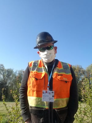 Jeremy Koole in PPE gear wearing mask-1
